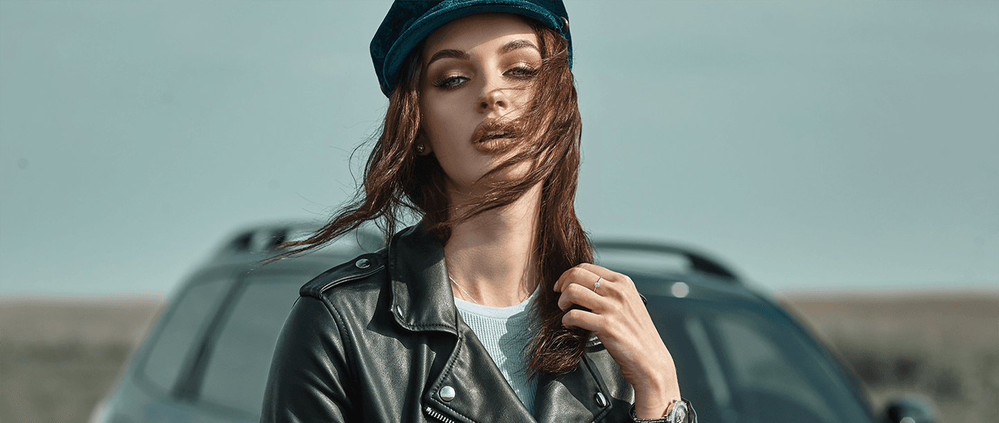 Model wearing FRAME clothing brand's leather jacket and velvet hat.